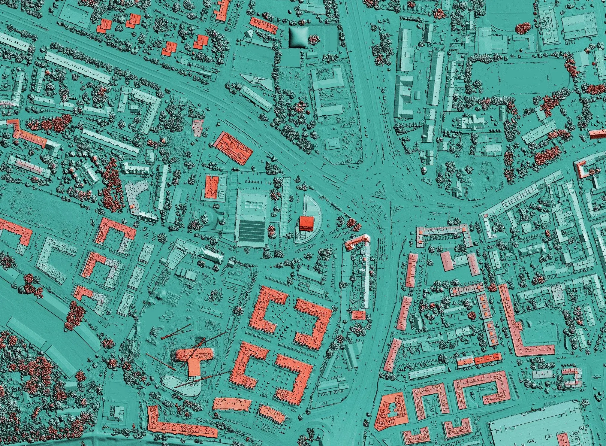 Legacy record drawings are the input; a georeferenced, attributed network is the output.